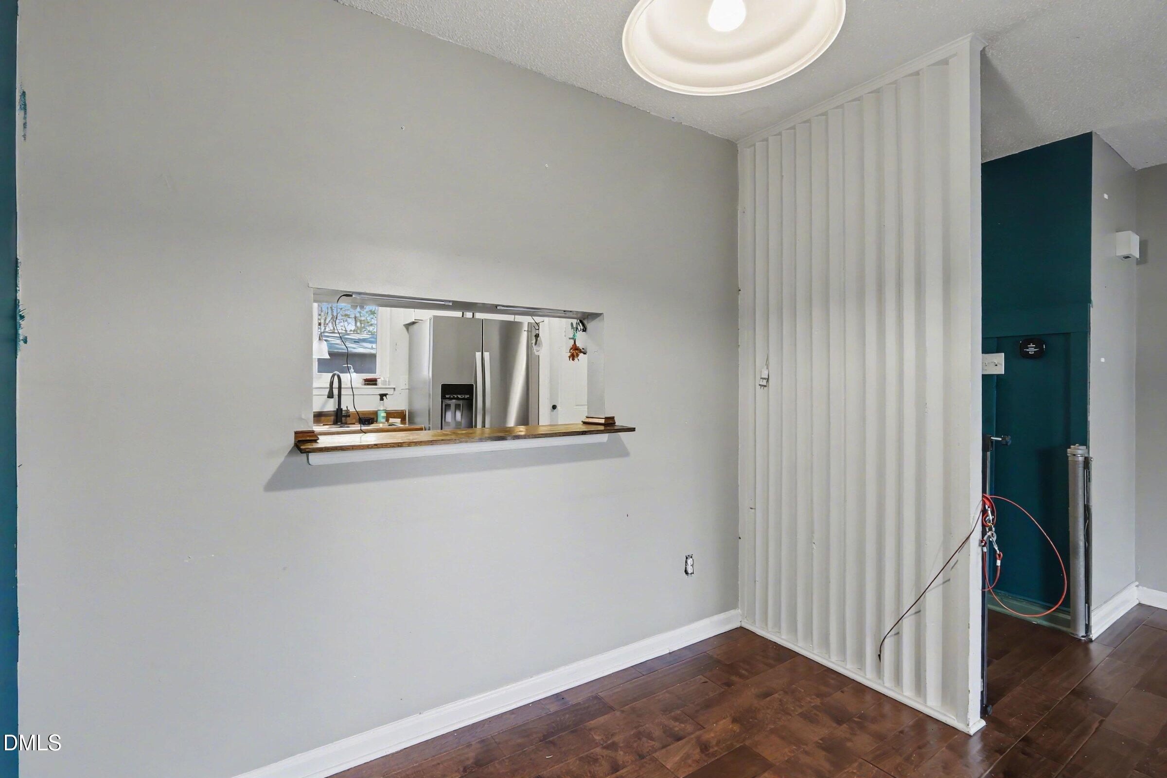 4271 Lake Ridge Drive Raleigh, NC 27604 - Photo 13 of 36 wooden floor in an empty room