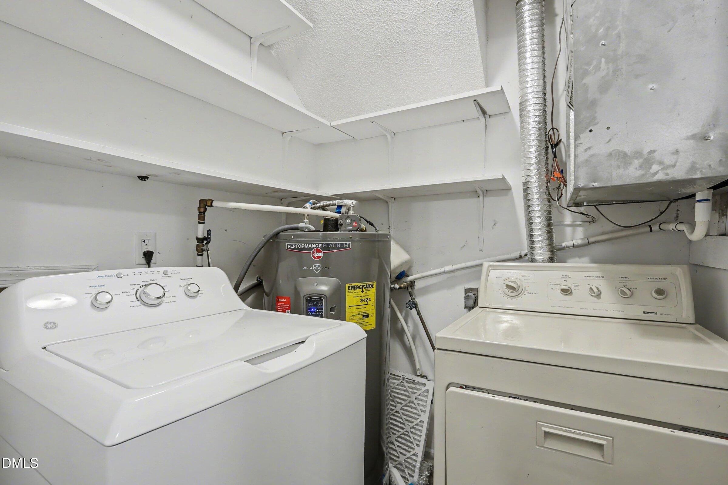 4271 Lake Ridge Drive Raleigh, NC 27604 - Photo 31 of 36 a utility room with dryer and washer