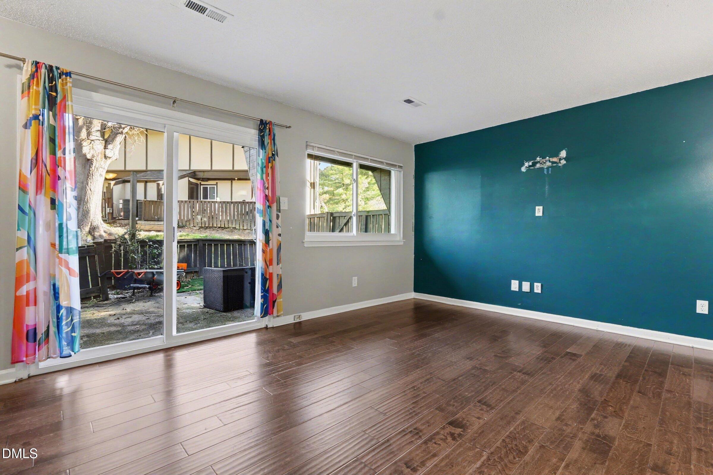 4271 Lake Ridge Drive Raleigh, NC 27604 - Photo 9 of 36 a view of livingroom with hardwood