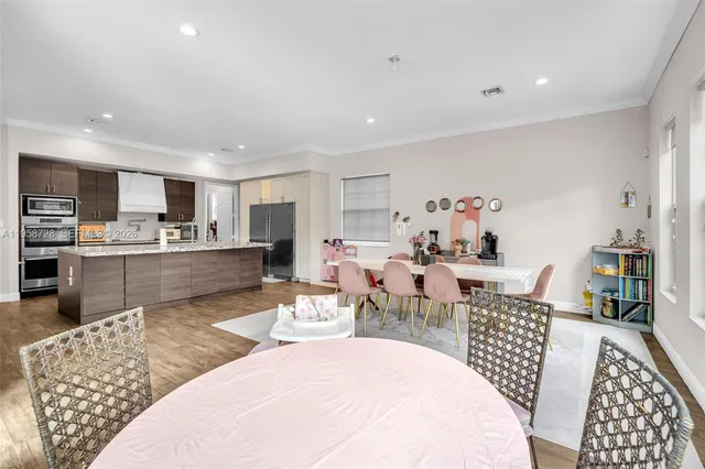 a view of a dining room with furniture