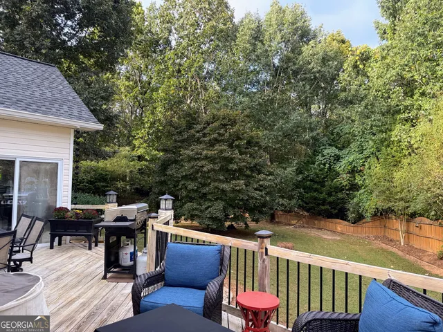 a table and chairs sitting in the garden