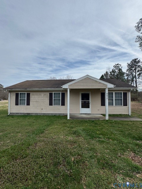 4459 Allen Road Jarratt, VA 23867 - Photo 1 of 1 a house is sitting in middle of the grass
