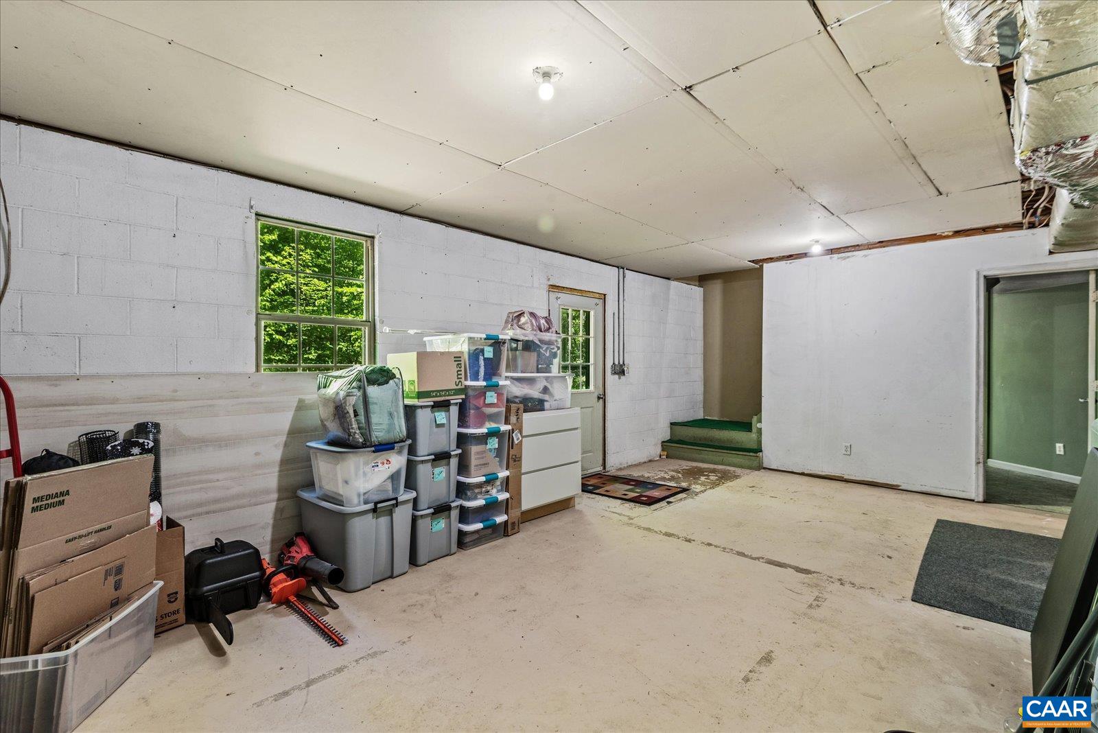 54 Courthouse Mountain Road Madison, VA 22727 - Photo 23 of 52 a room with furniture and a window