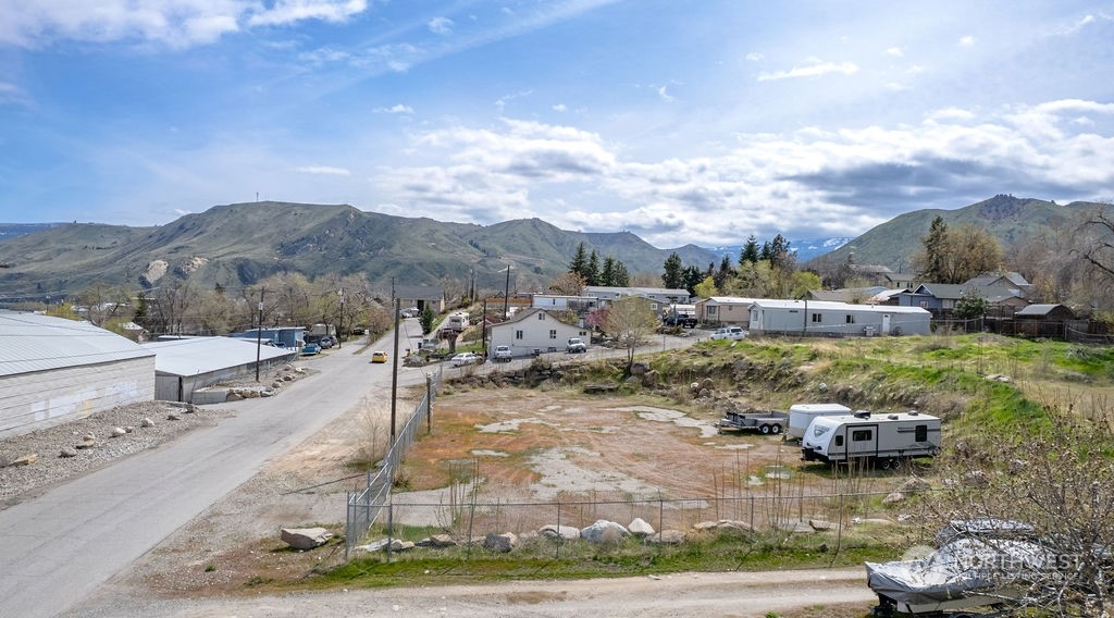 0 Crescent Street Wenatchee, WA 98801 - Photo 4 of 14 a view of a street with a yard