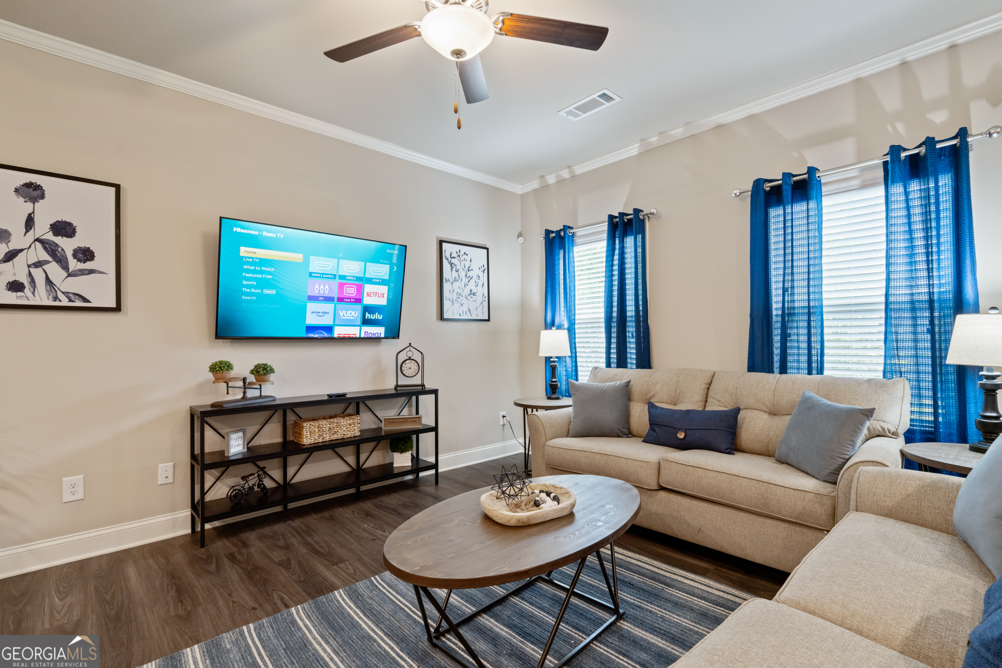 2029 Pinnacle Way Norcross, GA 30071 - Photo 12 of 30 a living room with furniture a rug and a flat screen tv