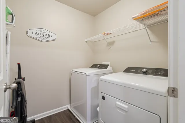 a utility room with dryer and washer