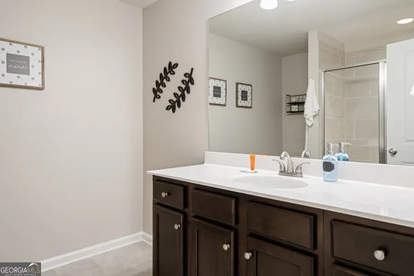 a sink with a mirror