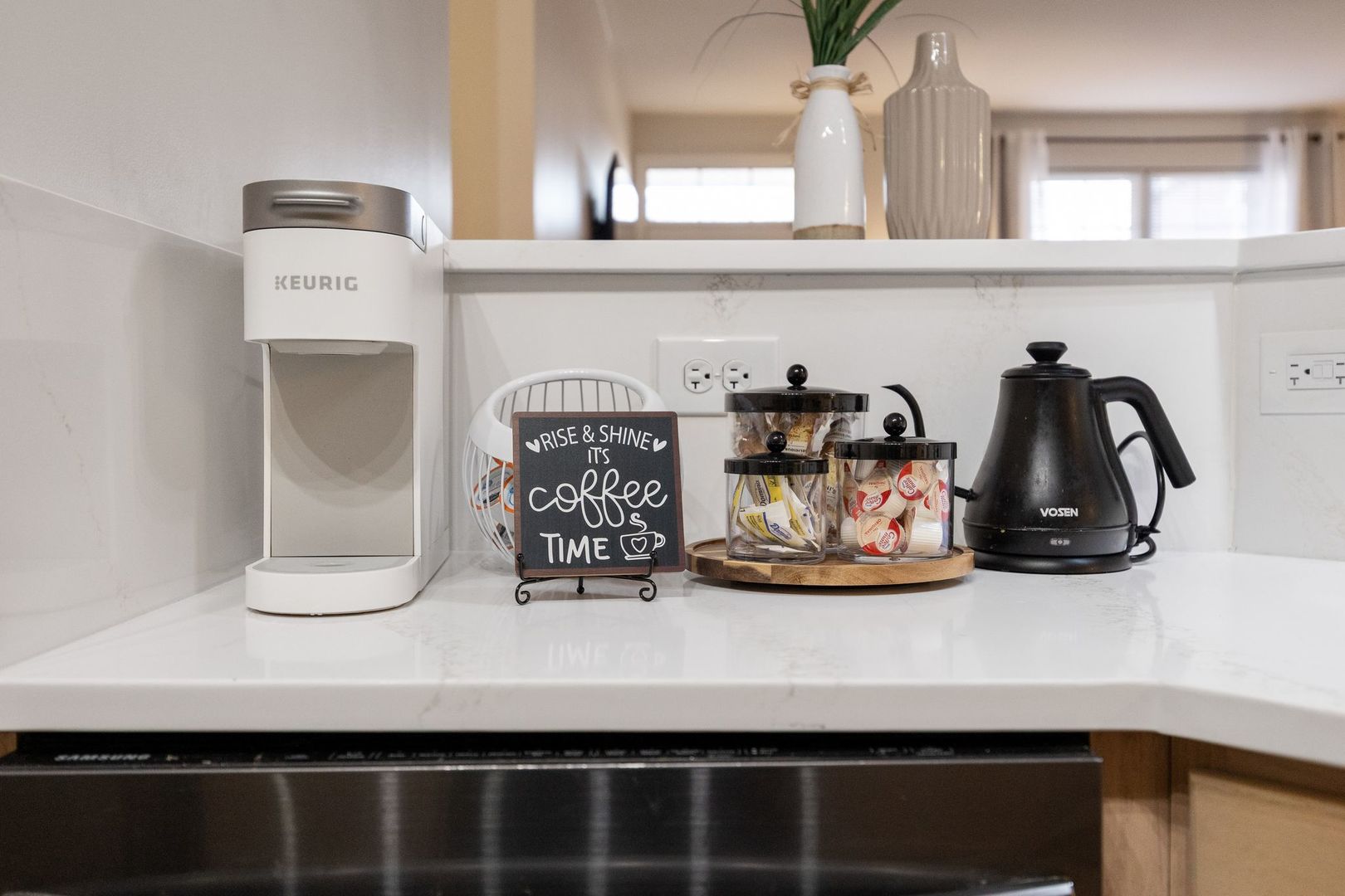 8232 Concord Lane, Unit B Justice, IL 60458 - Photo 11 of 32 a table with a vase and flowers on it