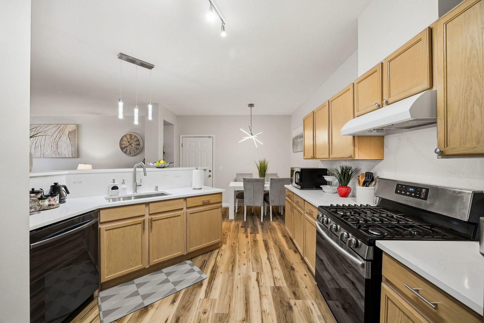 8232 Concord Lane, Unit B Justice, IL 60458 - Photo 14 of 32 a kitchen with lots of counter top space and stove
