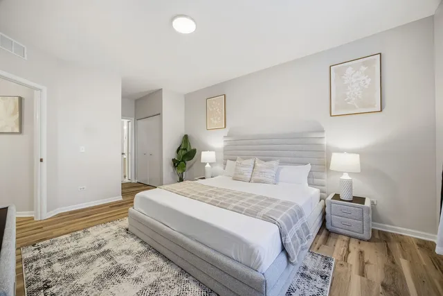 a bathroom with 2 sink and a mirror