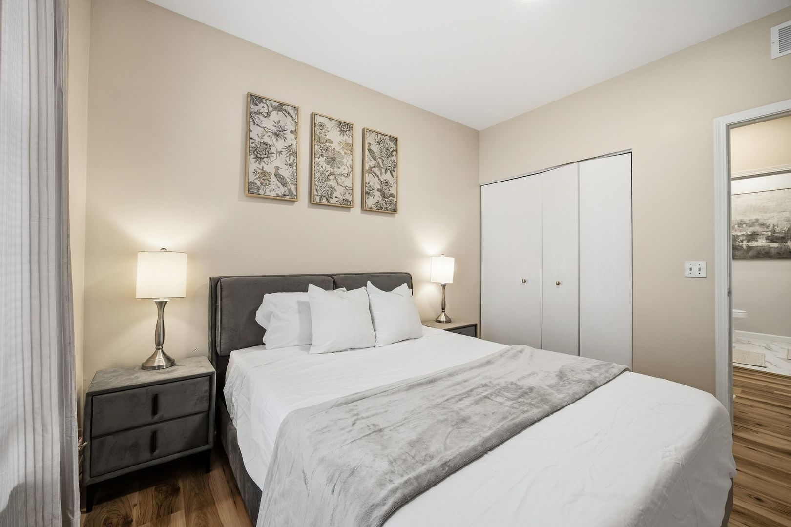 8232 Concord Lane, Unit B Justice, IL 60458 - Photo 29 of 32 a bedroom with a bed and a painting