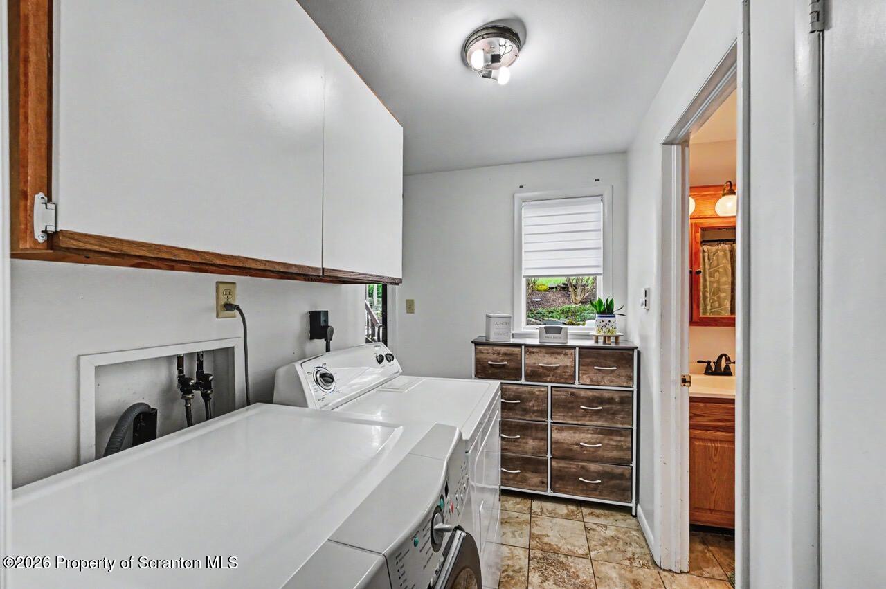 719 Scott Road Clarks Summit, PA 18411 - Photo 36 of 51 a room with a bed and a window