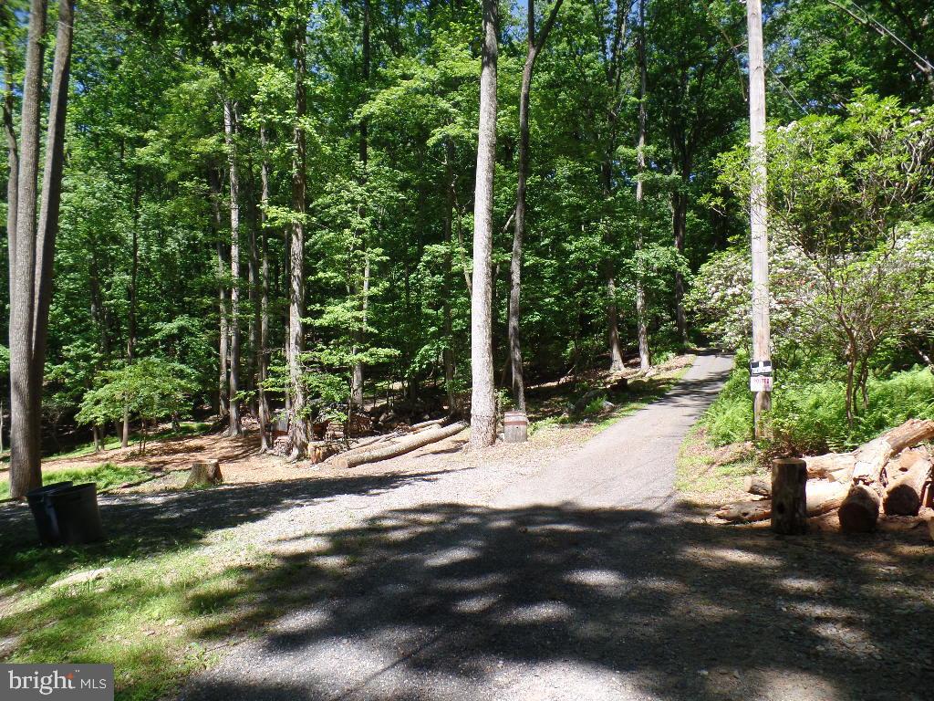 Park to the right - follow path to the well
