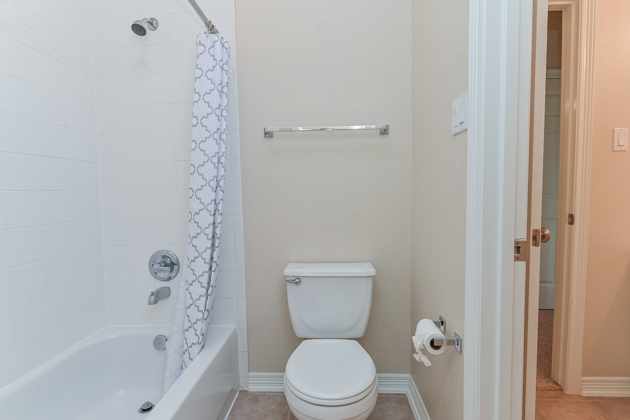 7218 Spring Run Lane Katy, TX 77494 - Photo 30 of 49 a white toilet sitting next to a bath tub