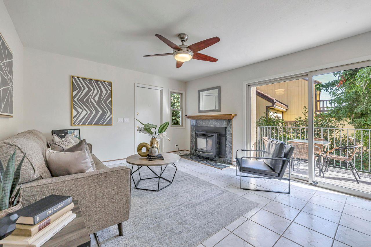 431 Green Hills Drive Millbrae, CA 94030 - Photo 11 of 50 a living room with furniture and a fireplace