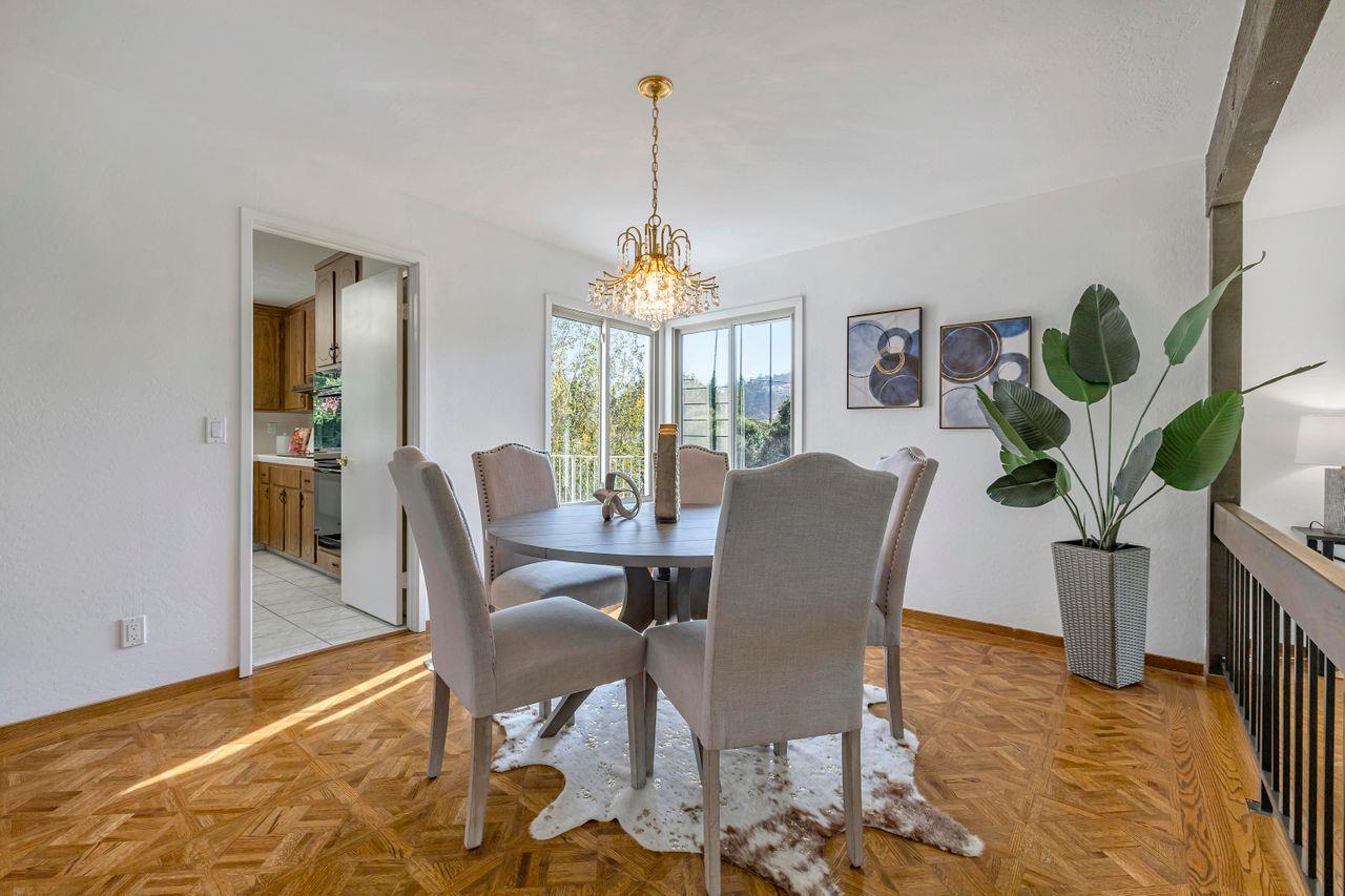 431 Green Hills Drive Millbrae, CA 94030 - Photo 17 of 50 a view of a dining room with furniture window and wooden floor