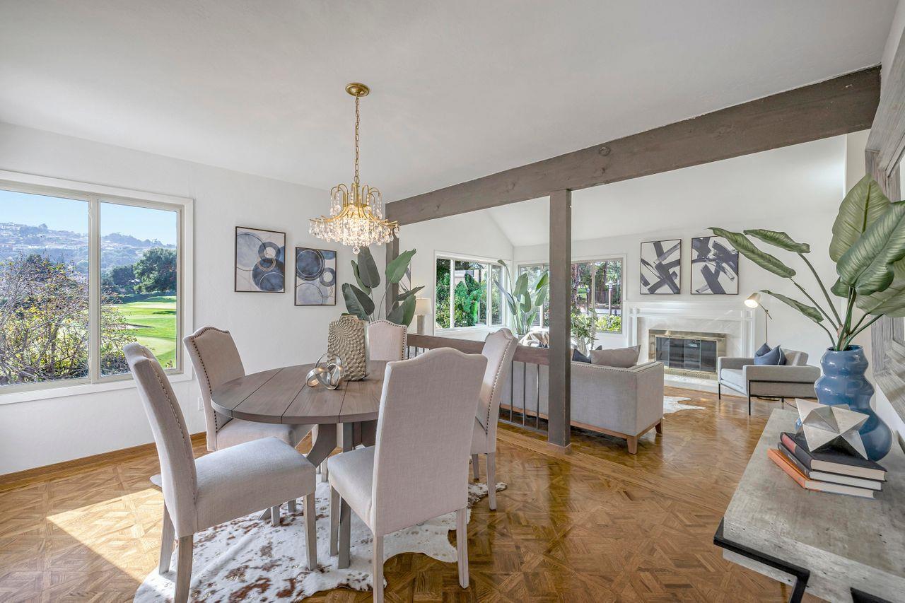 431 Green Hills Drive Millbrae, CA 94030 - Photo 18 of 50 a dining room with furniture a chandelier and wooden floor