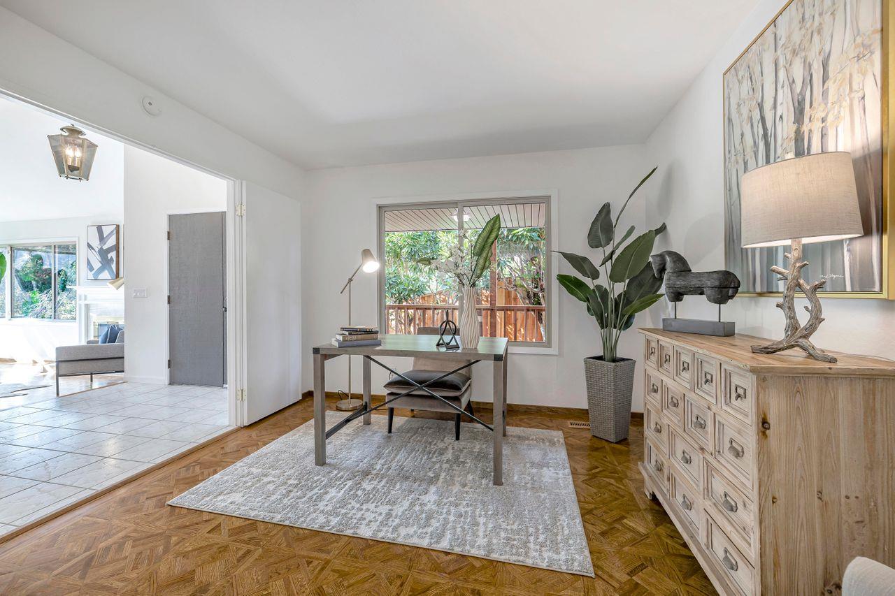 431 Green Hills Drive Millbrae, CA 94030 - Photo 20 of 50 a living room with furniture a large window and a wooden floor
