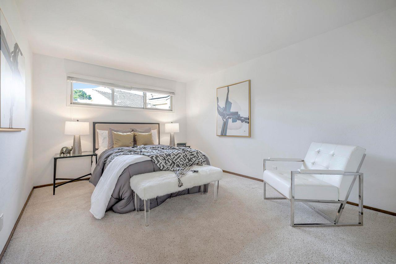 431 Green Hills Drive Millbrae, CA 94030 - Photo 23 of 50 a bedroom with a bed and a couch