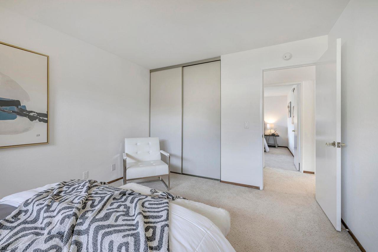 431 Green Hills Drive Millbrae, CA 94030 - Photo 24 of 50 a bedroom with a bed and a couch