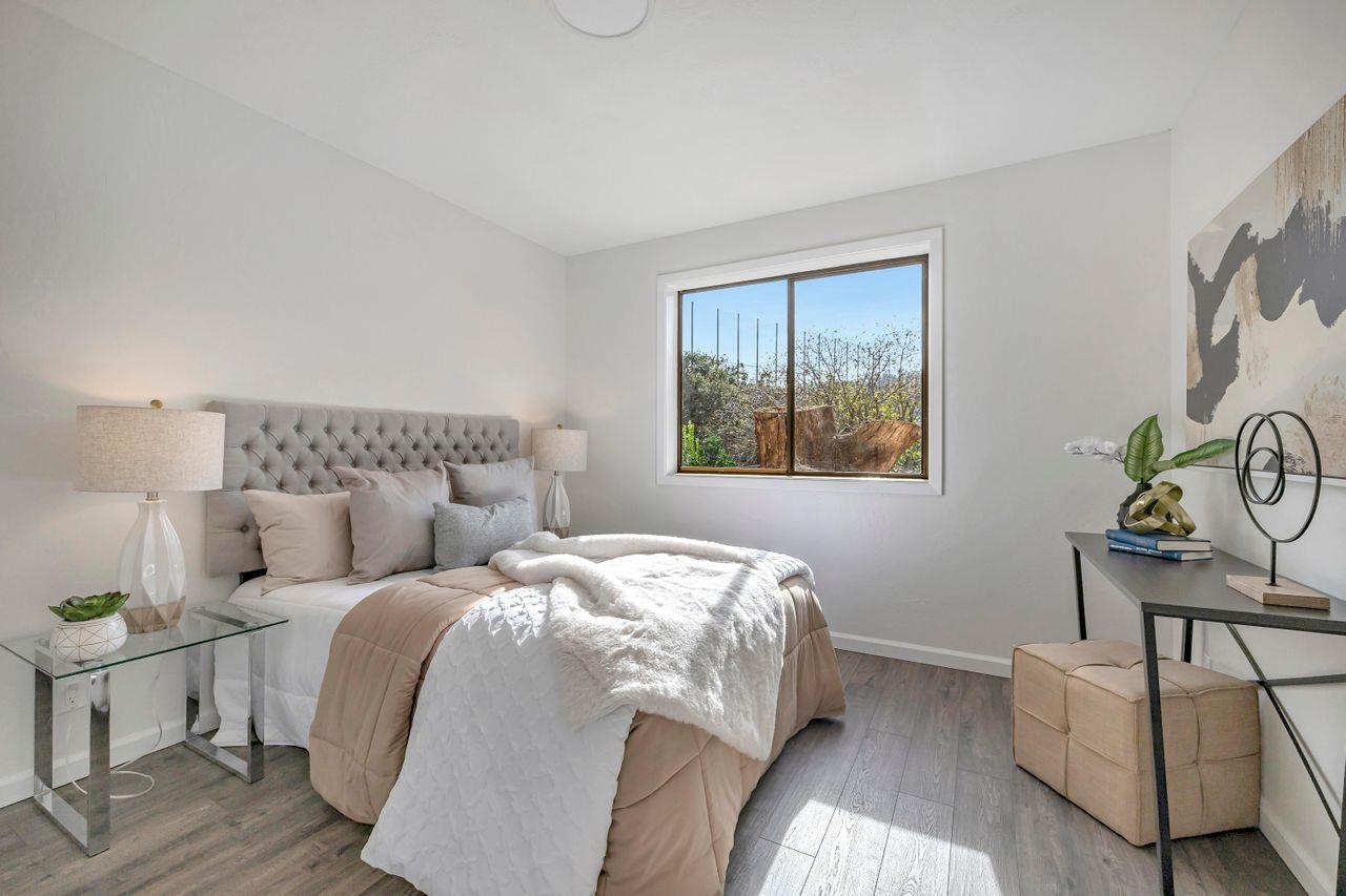 431 Green Hills Drive Millbrae, CA 94030 - Photo 27 of 50 a bed sitting in a bedroom next to a window