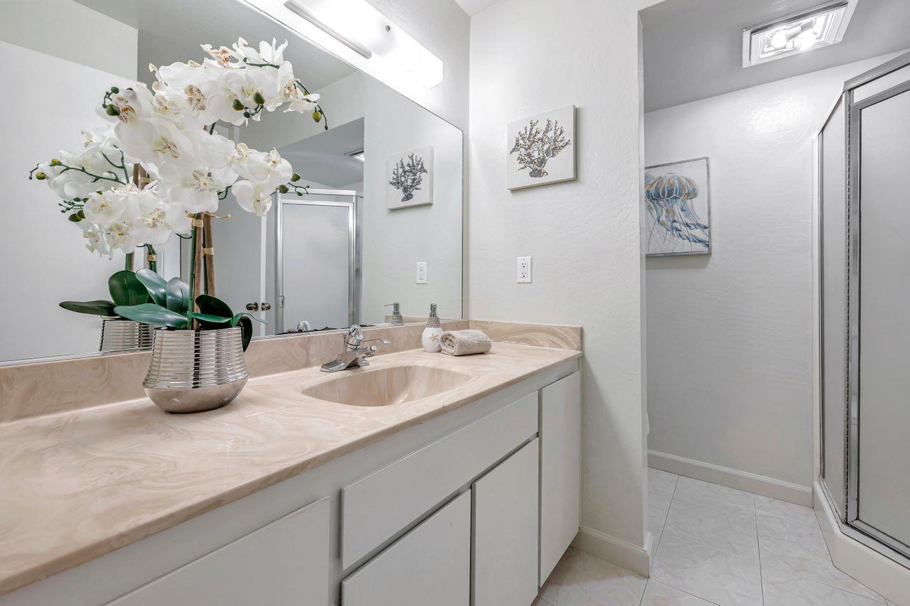 431 Green Hills Drive Millbrae, CA 94030 - Photo 29 of 50 a bathroom with a sink vanity and a mirror