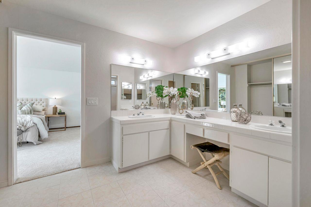 431 Green Hills Drive Millbrae, CA 94030 - Photo 31 of 50 a bathroom with a sink vanity and mirror