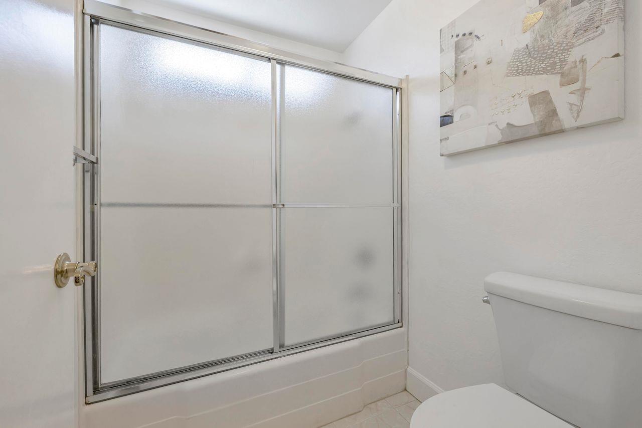 431 Green Hills Drive Millbrae, CA 94030 - Photo 35 of 50 a bathroom with a shower and toilet