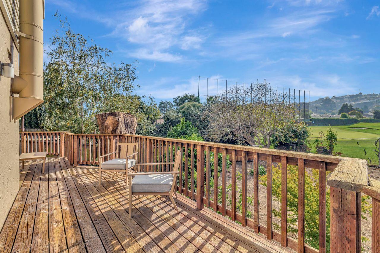 431 Green Hills Drive Millbrae, CA 94030 - Photo 42 of 50 a balcony with wooden floor and fence