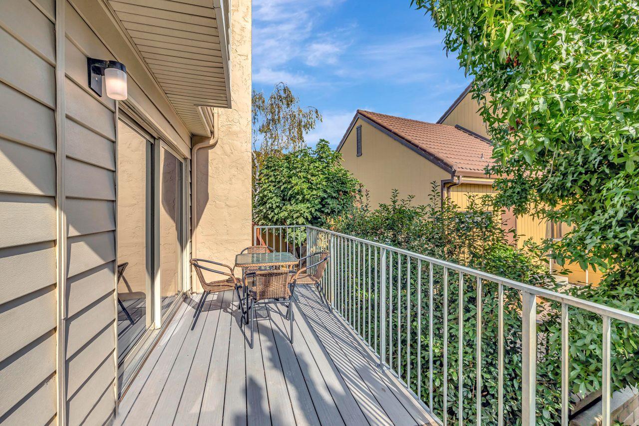 431 Green Hills Drive Millbrae, CA 94030 - Photo 45 of 50 a view of balcony with chairs and wooden fence