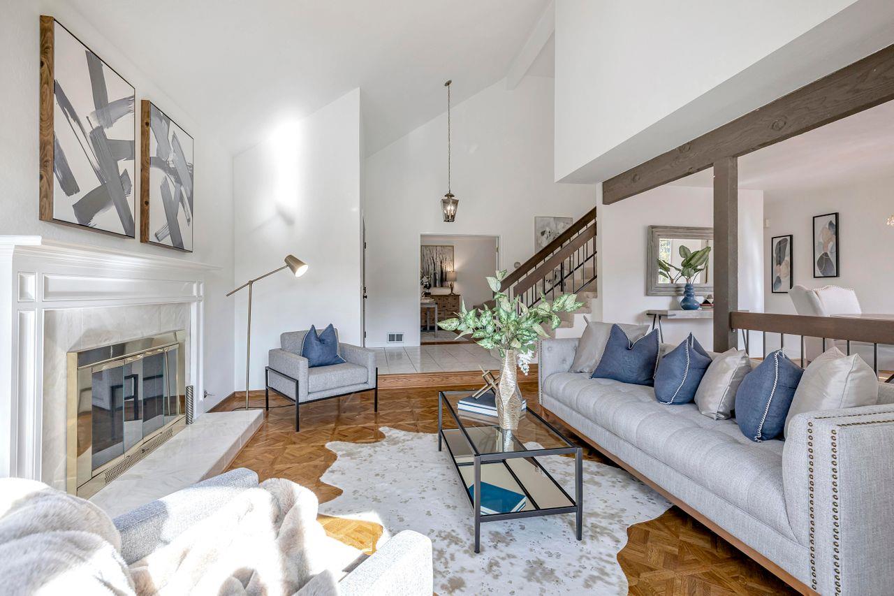 431 Green Hills Drive Millbrae, CA 94030 - Photo 6 of 50 a living room with furniture and a fireplace