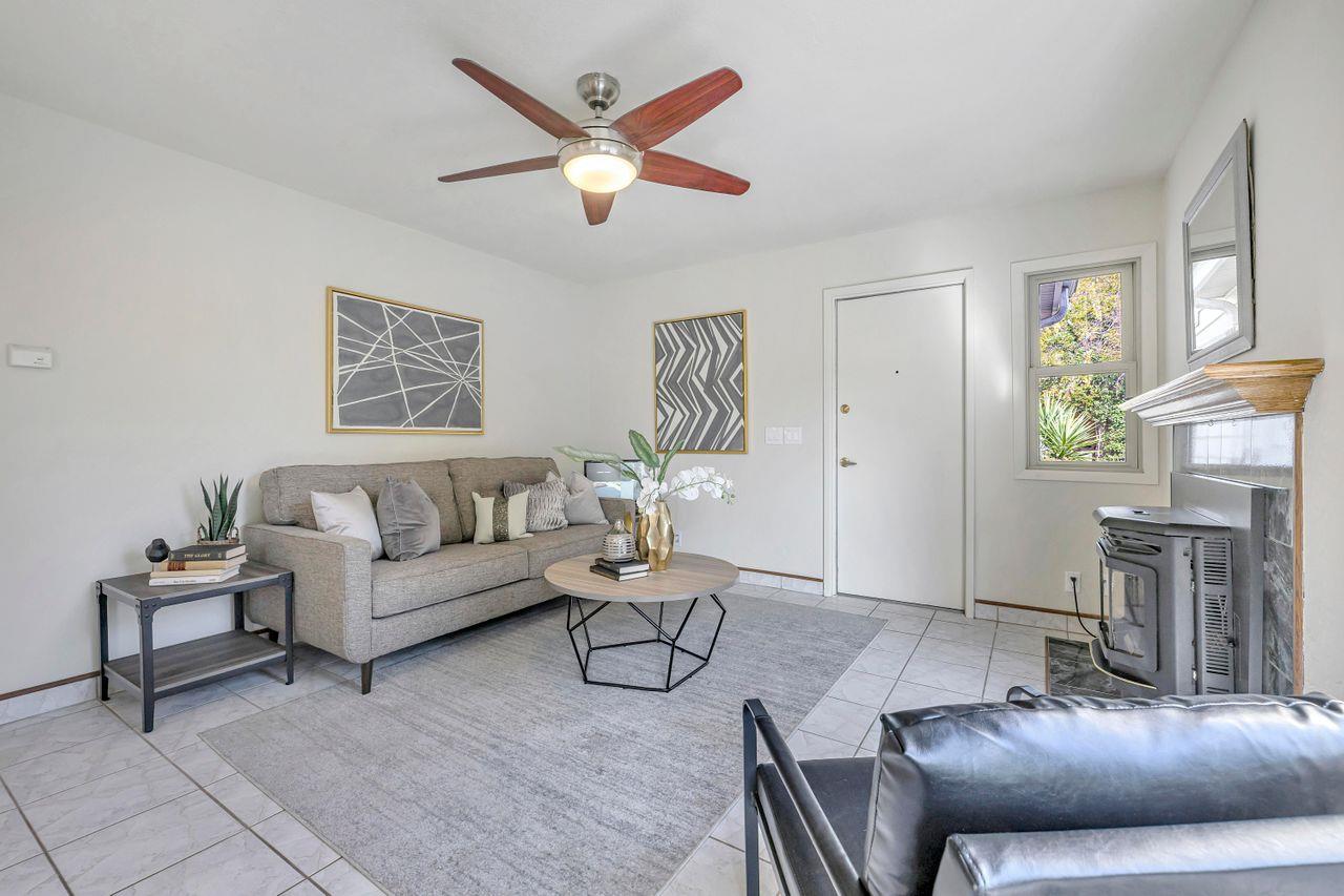 431 Green Hills Drive Millbrae, CA 94030 - Photo 8 of 50 a living room with furniture and a large window