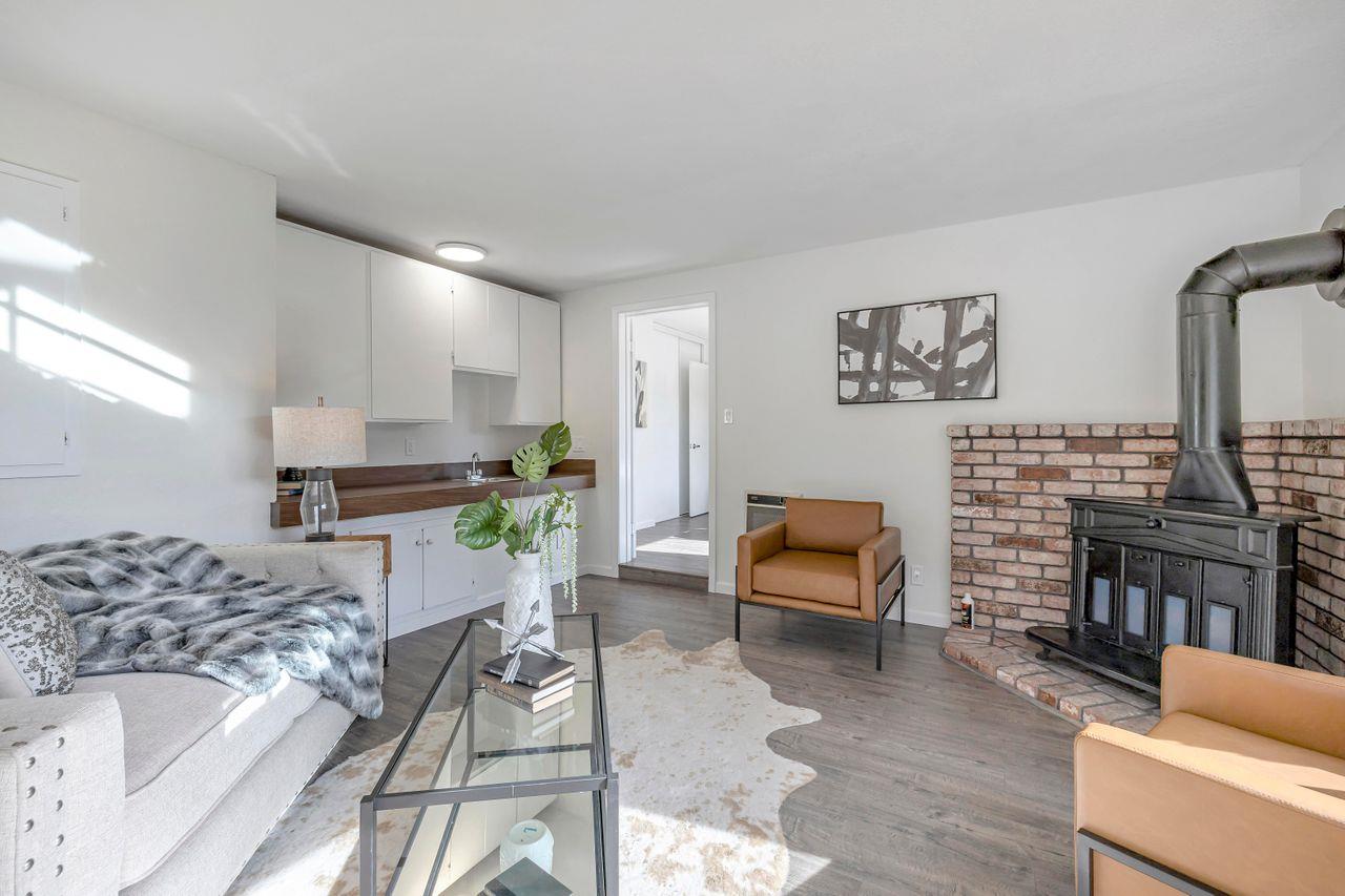 431 Green Hills Drive Millbrae, CA 94030 - Photo 10 of 50 a living room with furniture and a fireplace
