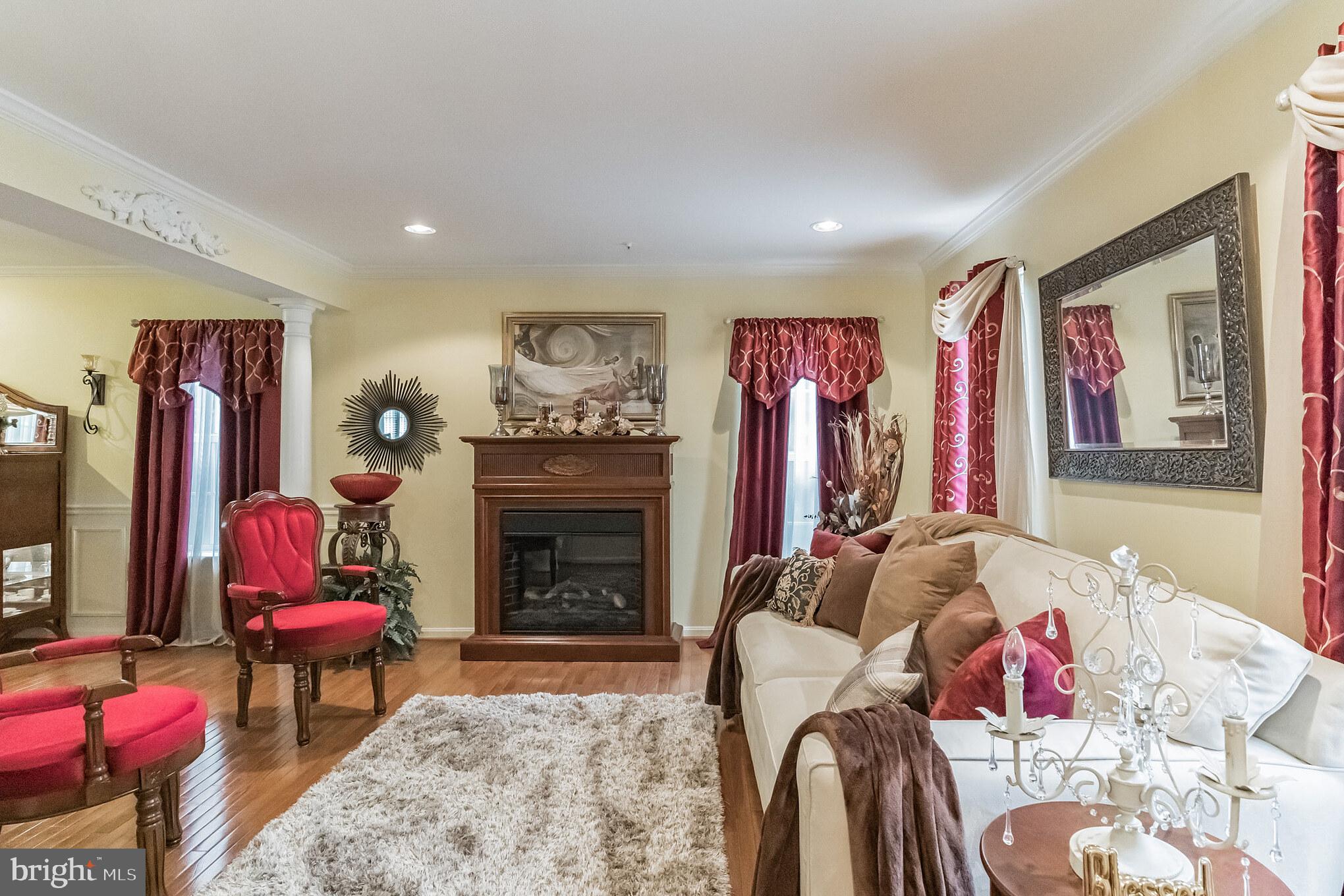 6416 Symposium Way Clinton, MD 20735 - Photo 3 of 29 Spacious Living Room - Electric Fireplace Excluded