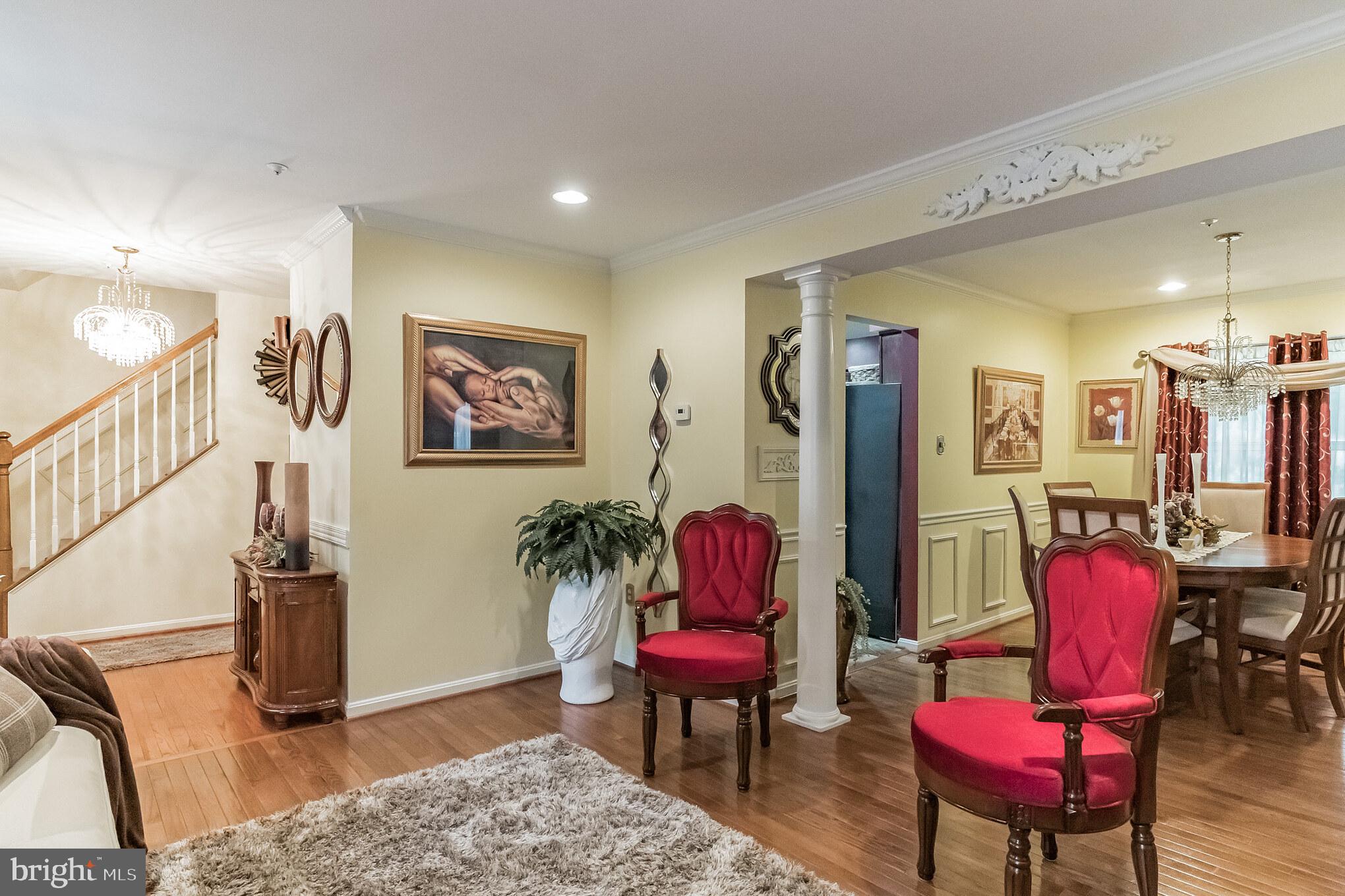 6416 Symposium Way Clinton, MD 20735 - Photo 4 of 29 Living Room Opens To Dining Room