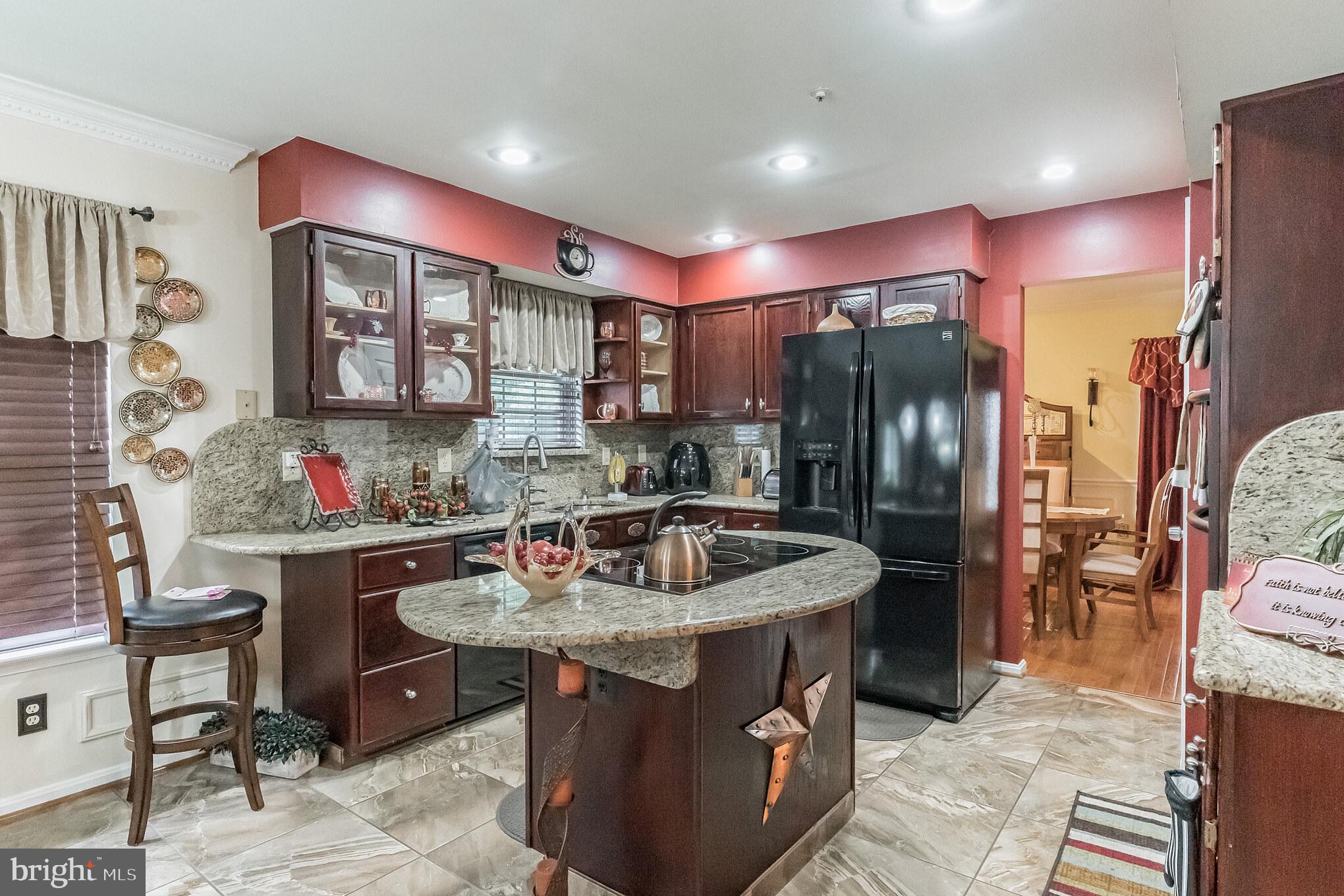 6416 Symposium Way Clinton, MD 20735 - Photo 8 of 29 Center Island