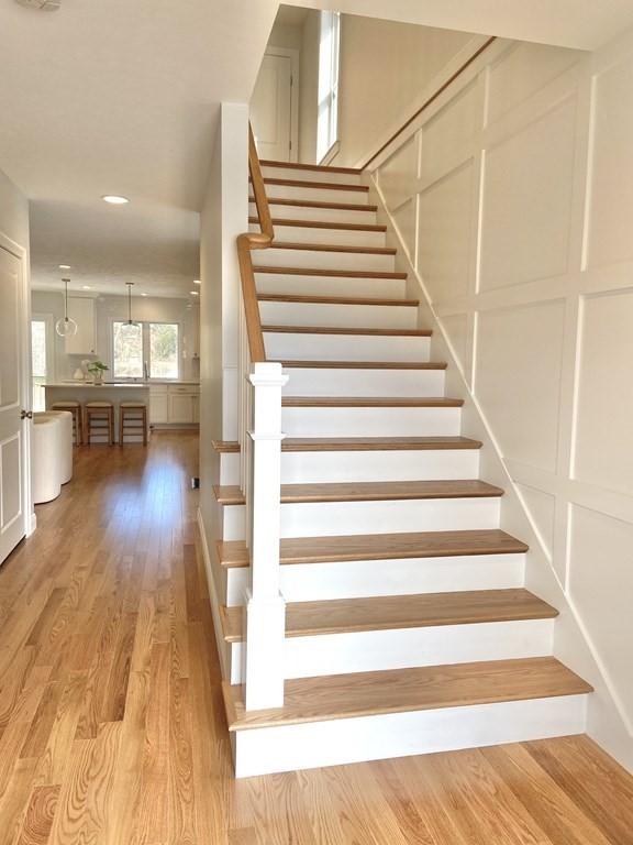 23 Sandy Pond Road, Unit 23 Ayer, MA 01432 - Photo 4 of 26 a view of entryway and hall with wooden floor