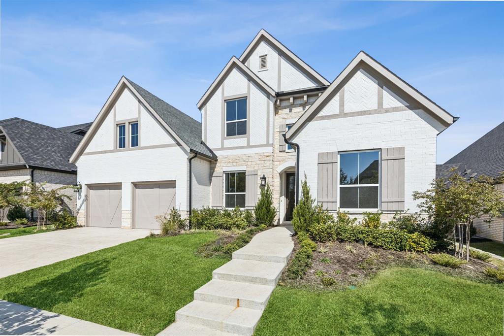 1608 Angus Trail Van Alstyne, TX 75495 - Photo 1 of 24 a front view of a house with a yard and porch