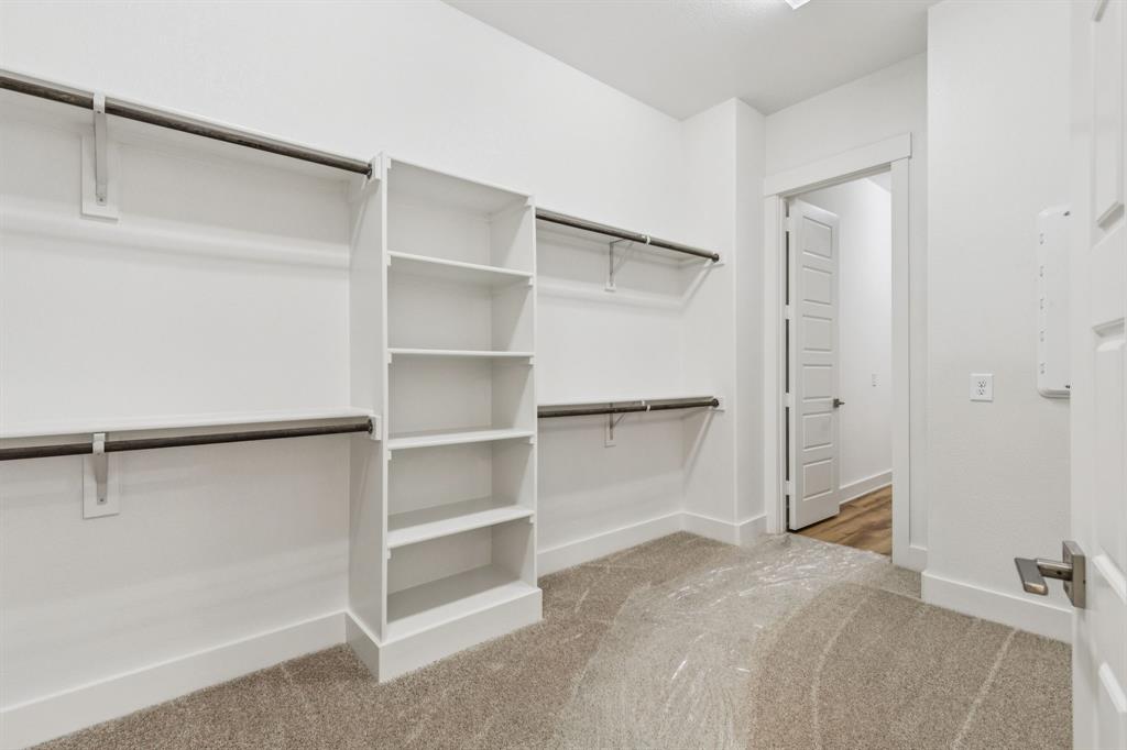 1608 Angus Trail Van Alstyne, TX 75495 - Photo 11 of 24 a view of an empty walk in closet