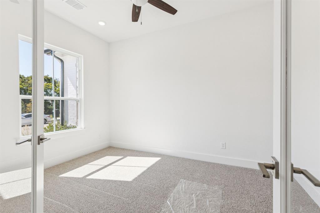 1608 Angus Trail Van Alstyne, TX 75495 - Photo 7 of 24 an empty room with windows