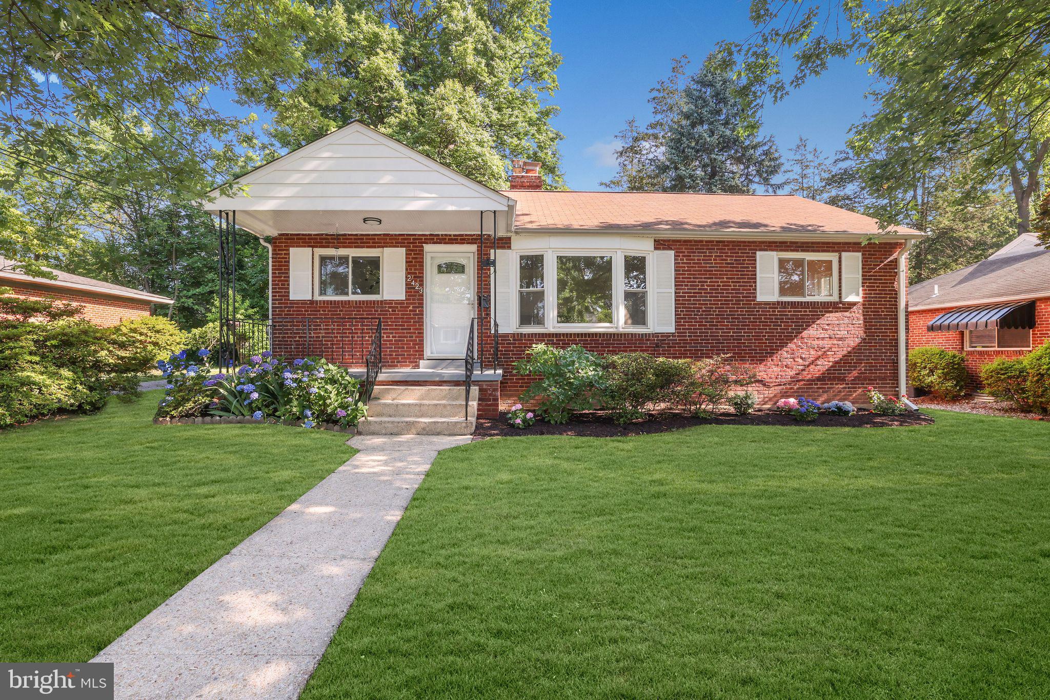 2423 Homestead Drive Silver Spring, MD 20902 - Photo 1 of 45 a front view of a house with a yard
