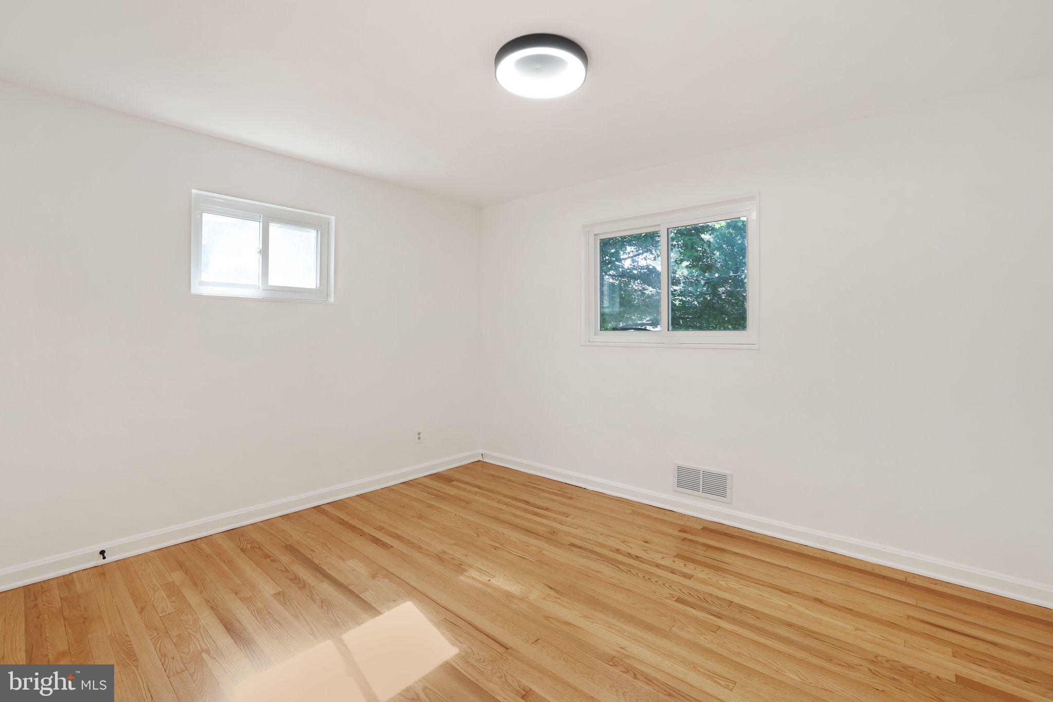 2423 Homestead Drive Silver Spring, MD 20902 - Photo 17 of 45 an empty room with a window