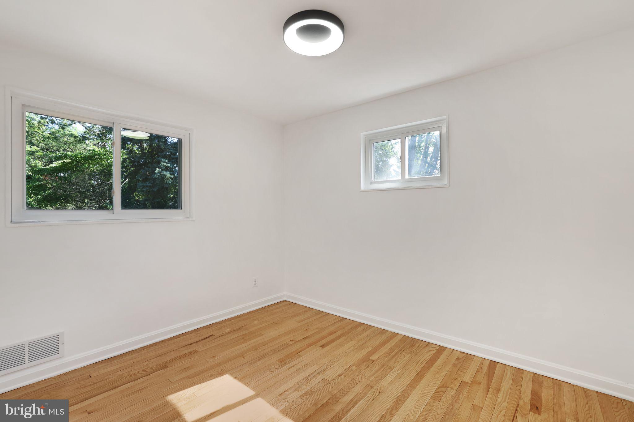 2423 Homestead Drive Silver Spring, MD 20902 - Photo 20 of 45 an empty room with a window