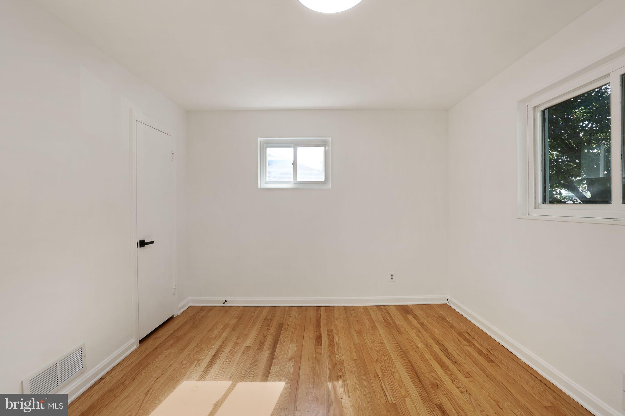 2423 Homestead Drive Silver Spring, MD 20902 - Photo 21 of 45 a view of a room that has wooden floor and cabinets