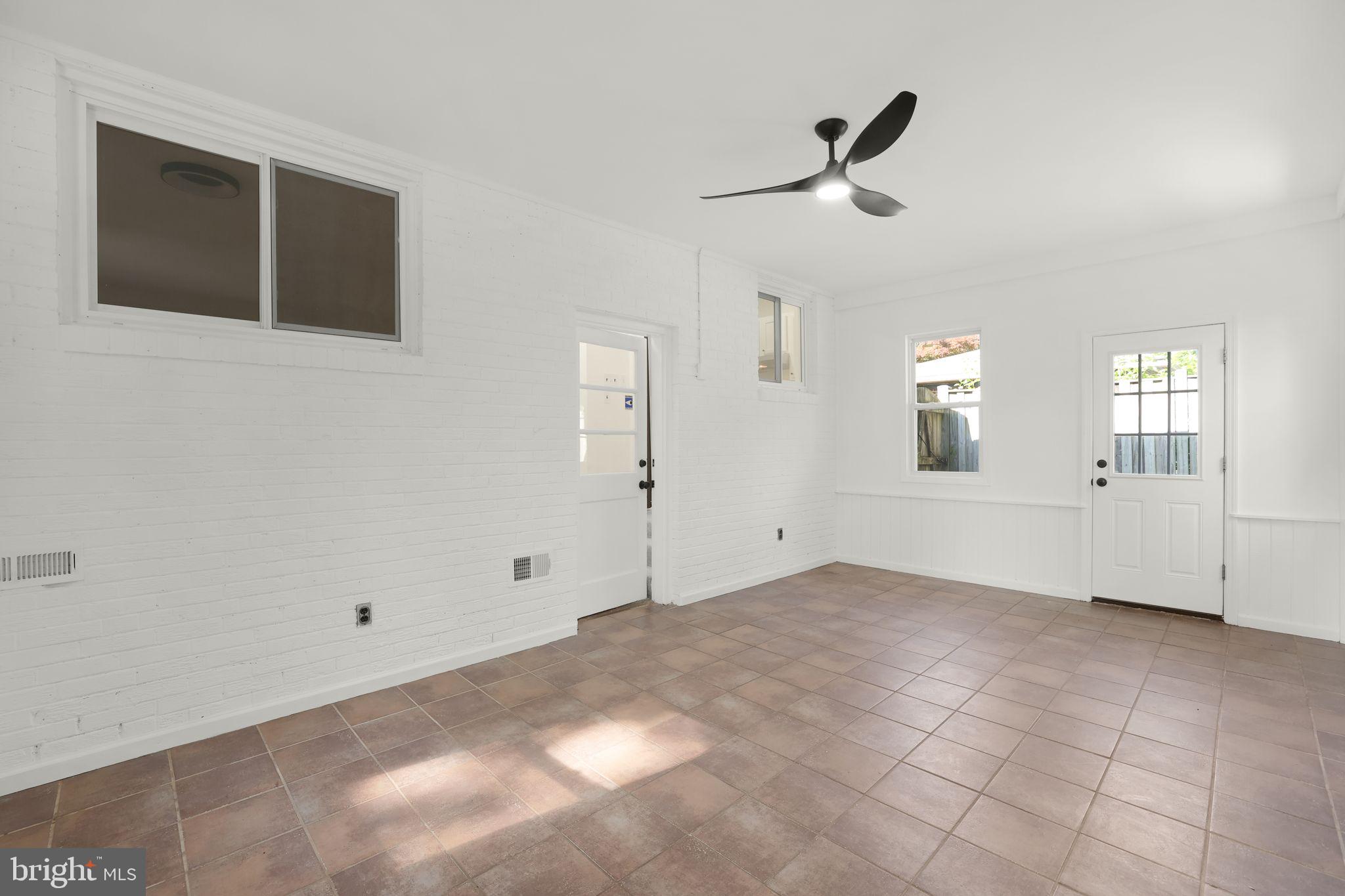 2423 Homestead Drive Silver Spring, MD 20902 - Photo 27 of 45 a view of an empty room with a window