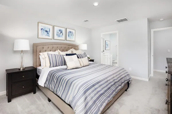 a bathroom with a sink toilet and a mirror