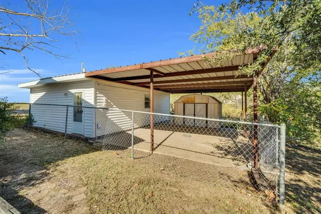 a house with trees in front of it