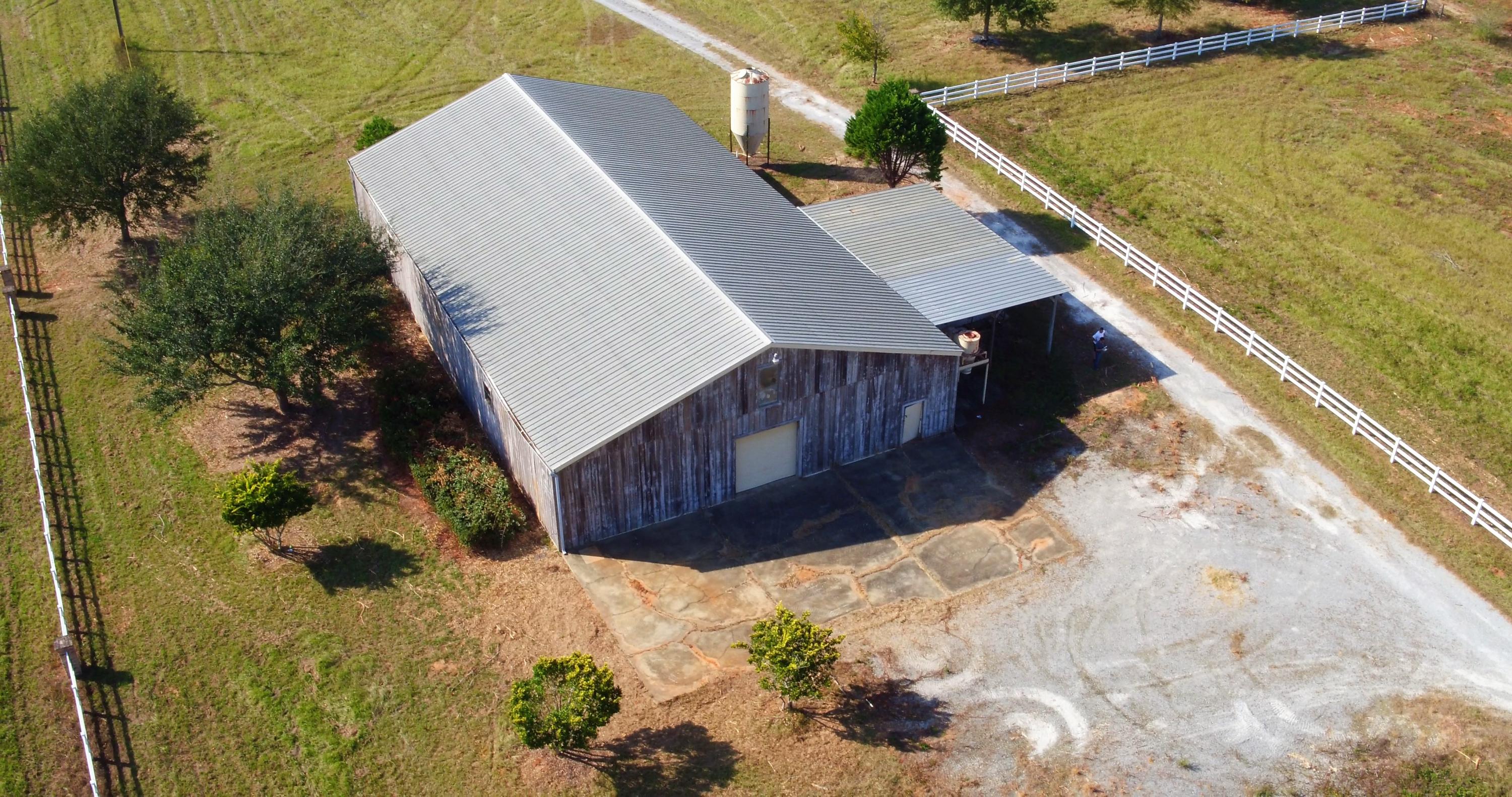 5437 Griffith Mill Road Baker, FL 32531 - Photo 42 of 100 a view of balcony with wooden floor