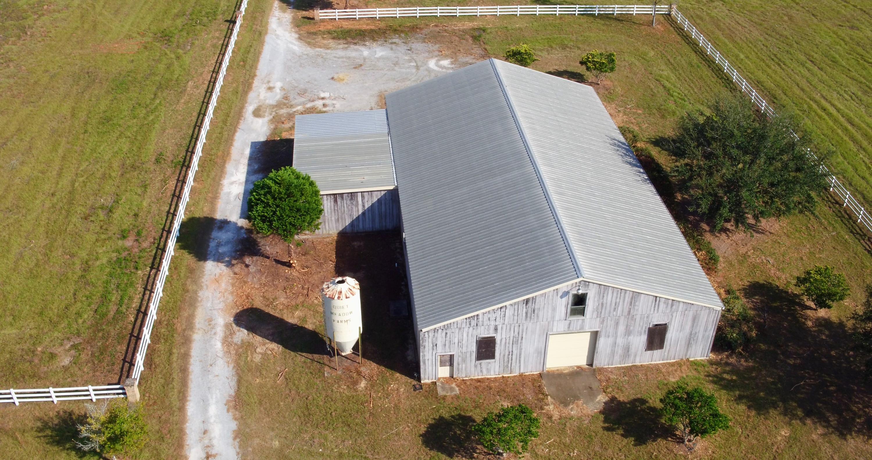 5437 Griffith Mill Road Baker, FL 32531 - Photo 47 of 100 aerial view of a house with a yard