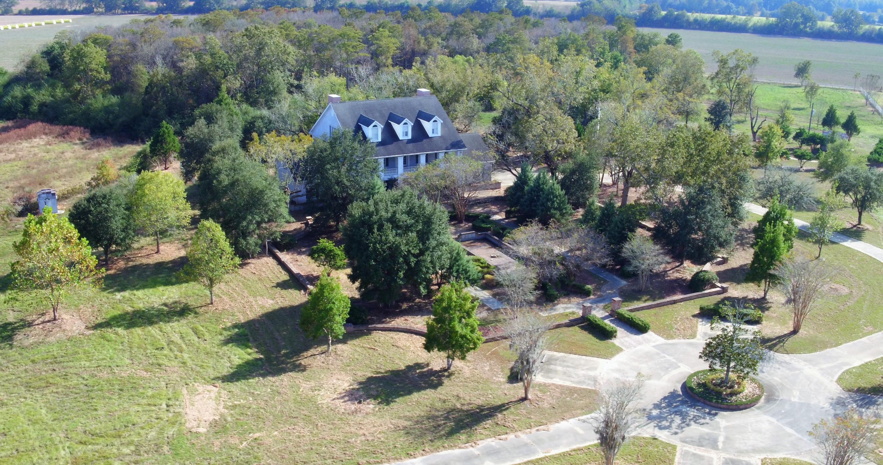 5437 Griffith Mill Road Baker, FL 32531 - Photo 58 of 100 an aerial view of a house with a yard